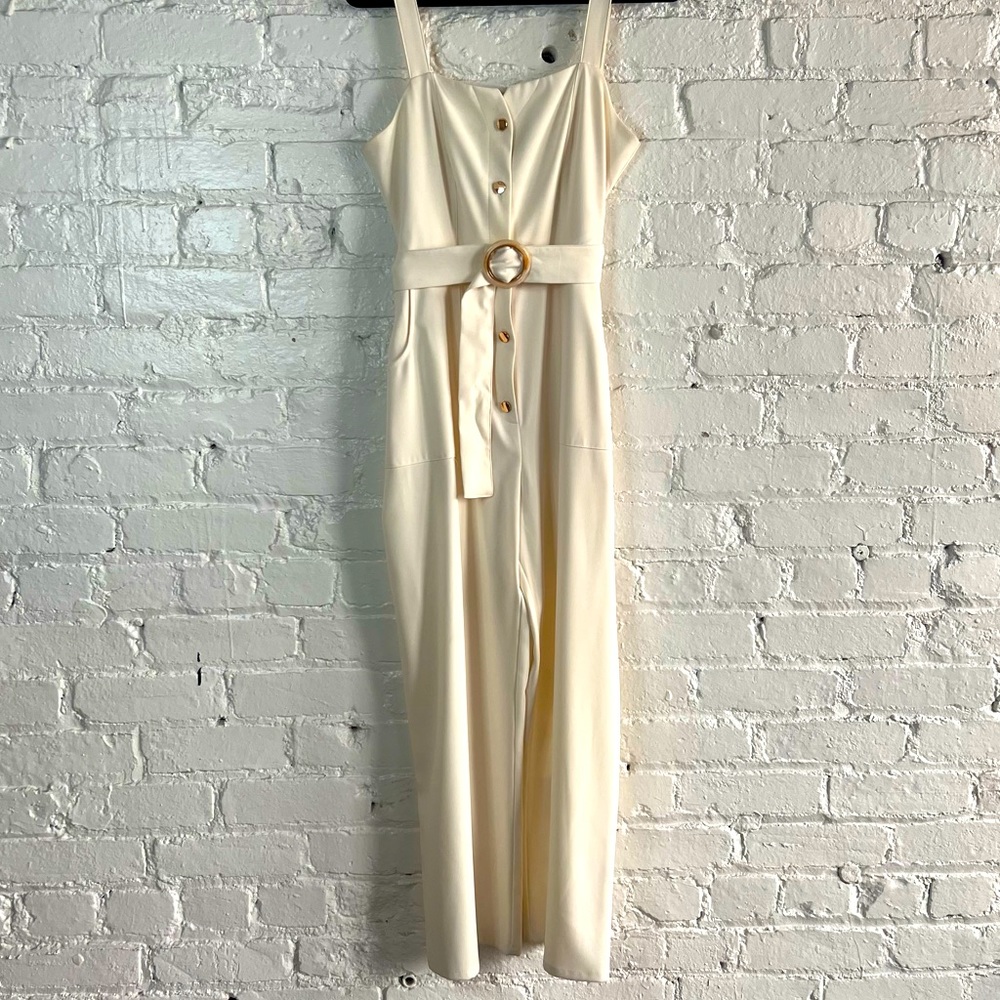 Chic off white jumpsuit with wide leg